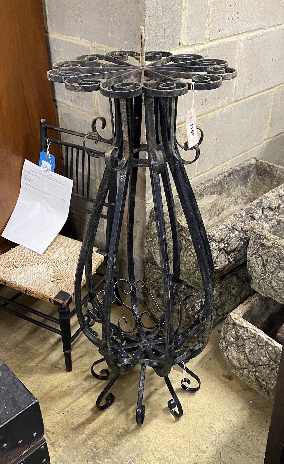 A painted wrought iron garden pedestal, height 98cm